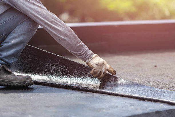 Professional Waterproofing technician working in Augusta, KY